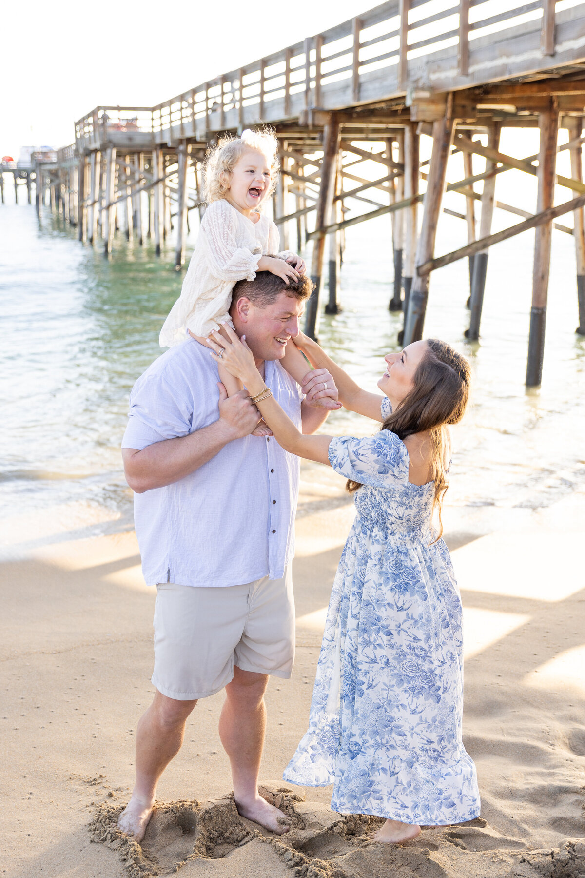 family photo at newport beach pier