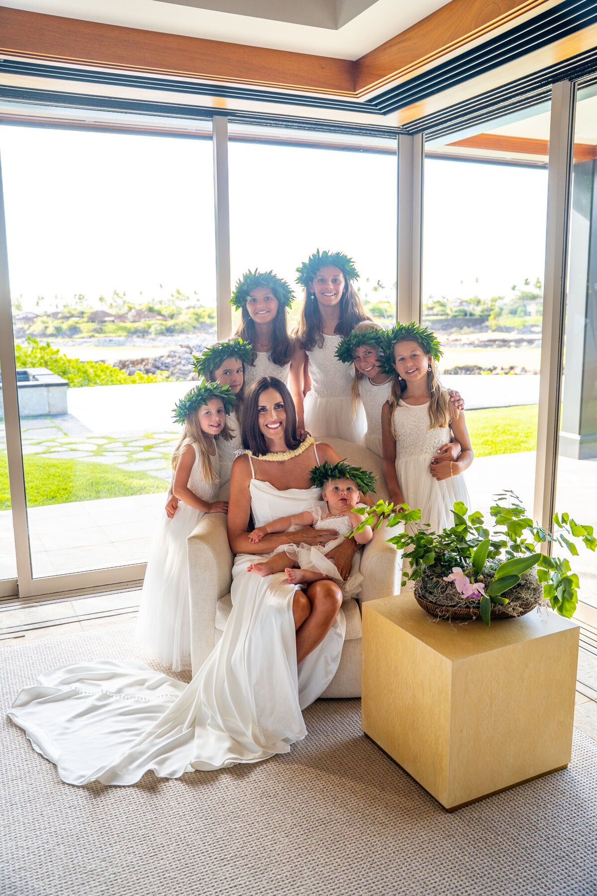 Bride surrounded by kids, taken by wedding photographers on the big island of hawaii
