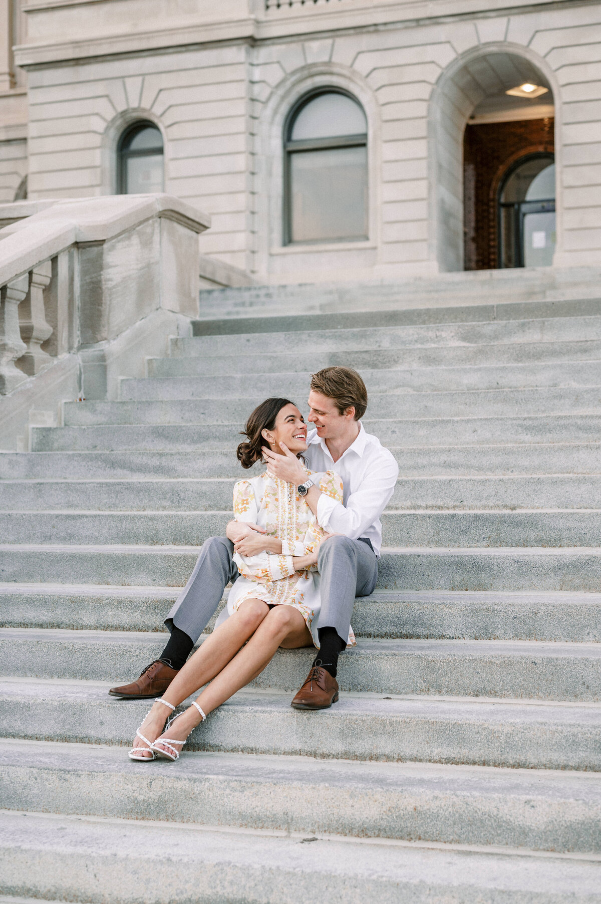 engaged couple on the steps at Central High School