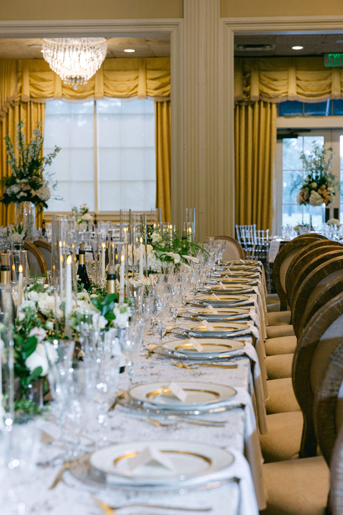 A wedding day photo showing off the tables in the reception hall for the wedding
