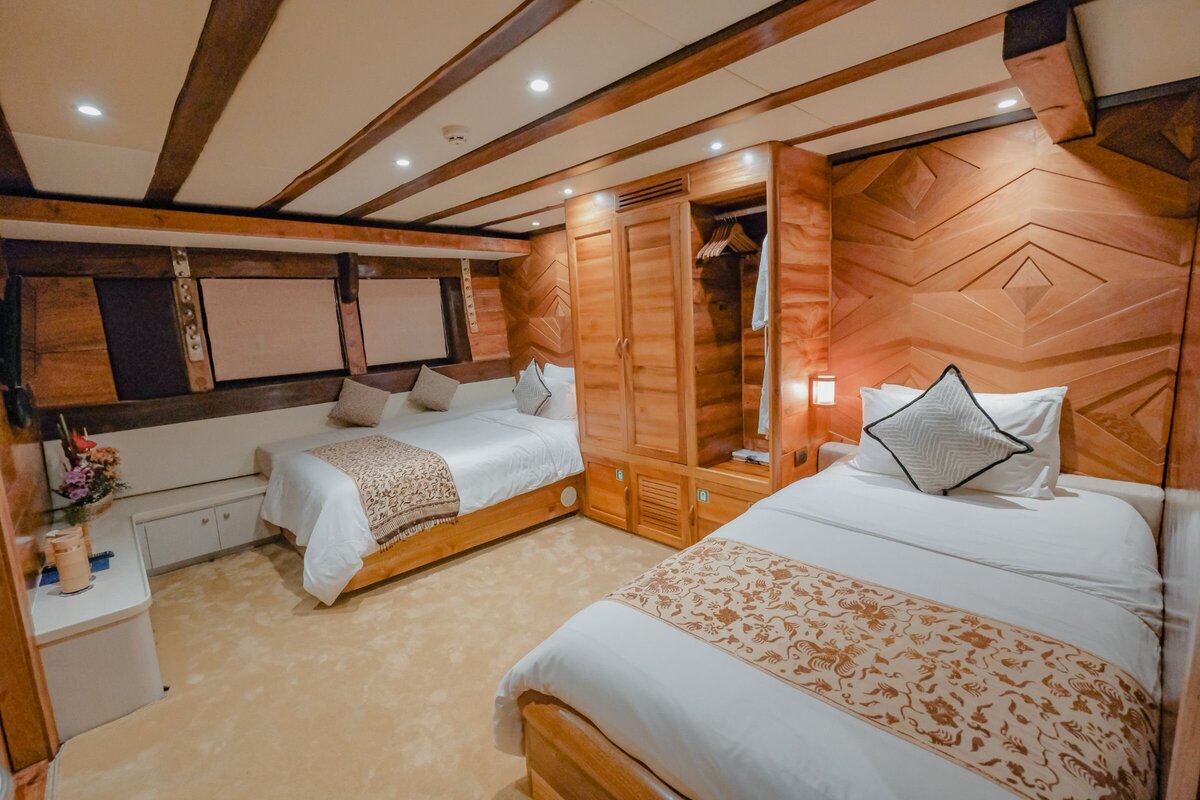 Contemporary twin cabin onboard Lamima luxury superyacht in Indonesia