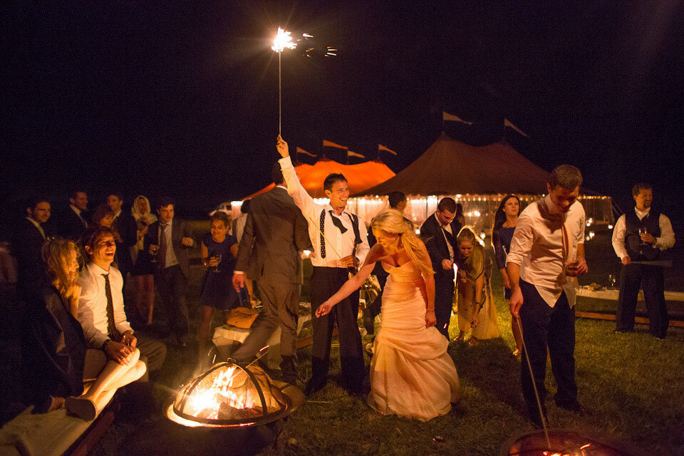 Sparklers at dusk with NY wedding planners In Any Event