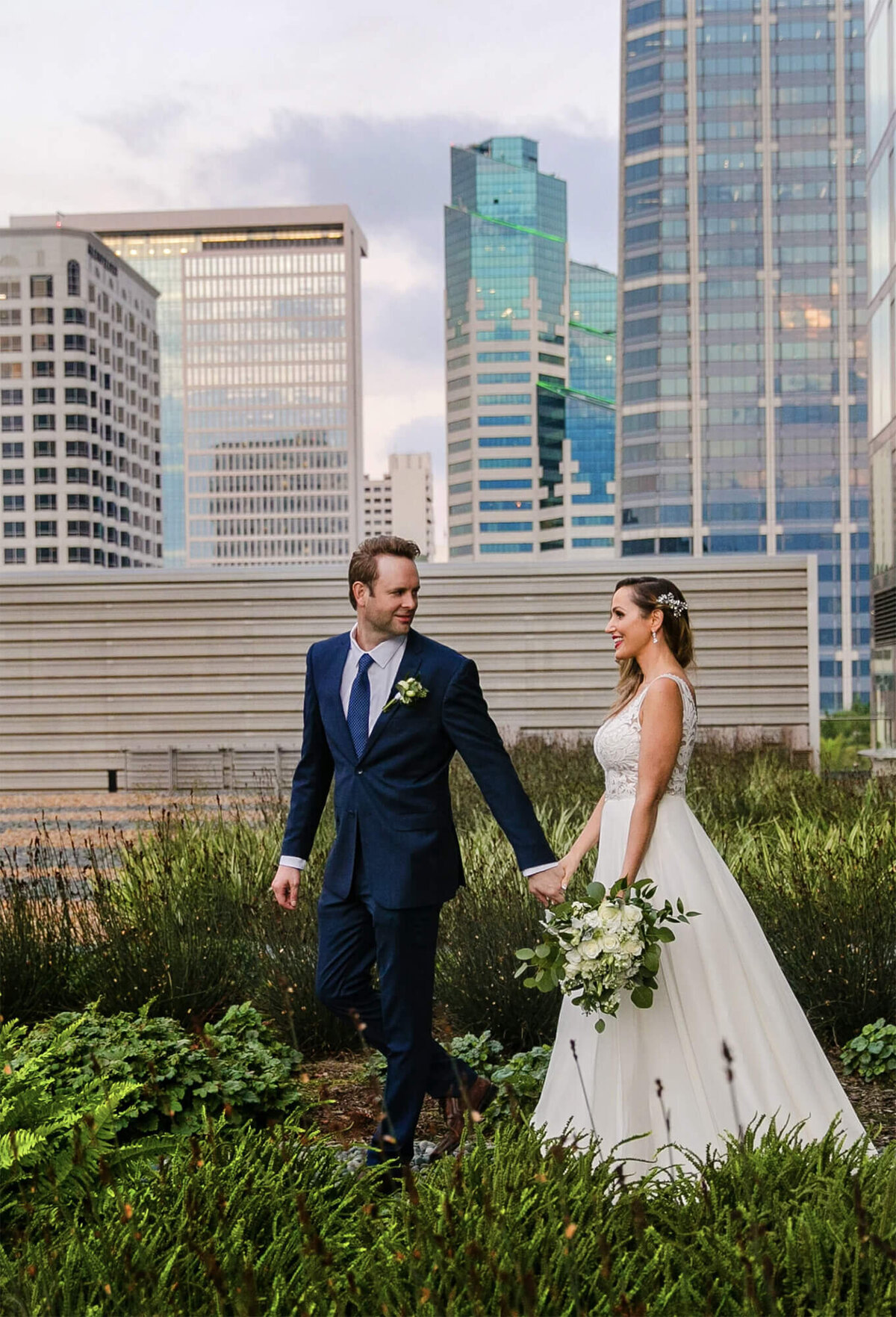 downtown-san-diego-intercontinental-hotel-rooftop-wedding-couple-walk