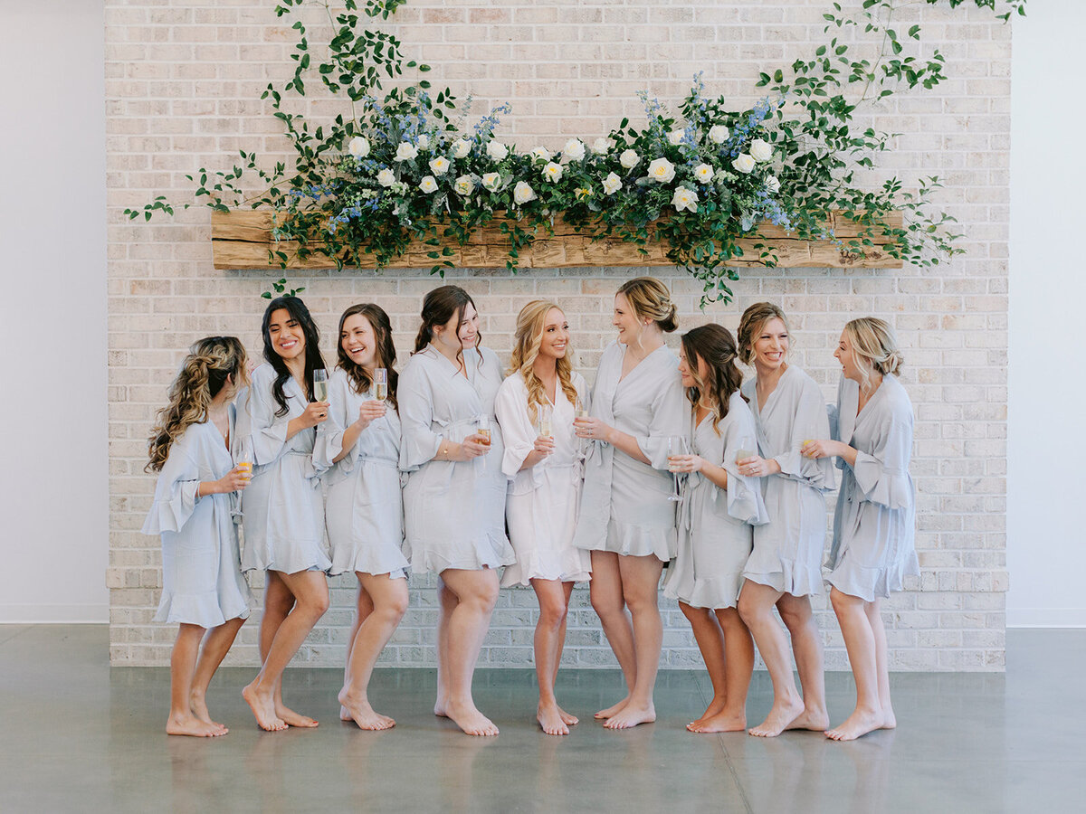 wedding party in blue robes