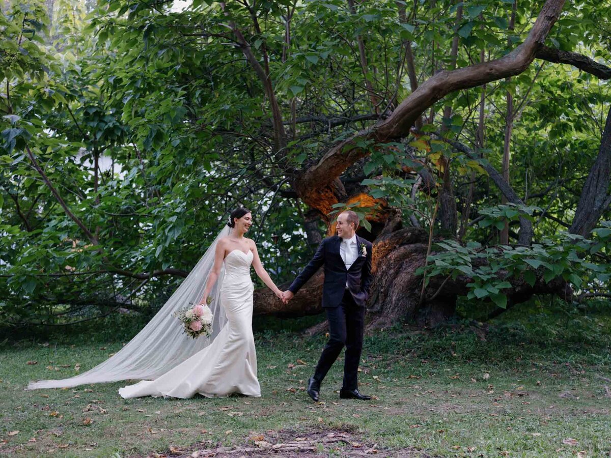 Classic bride and groom portrait at their private residence tented wedding.