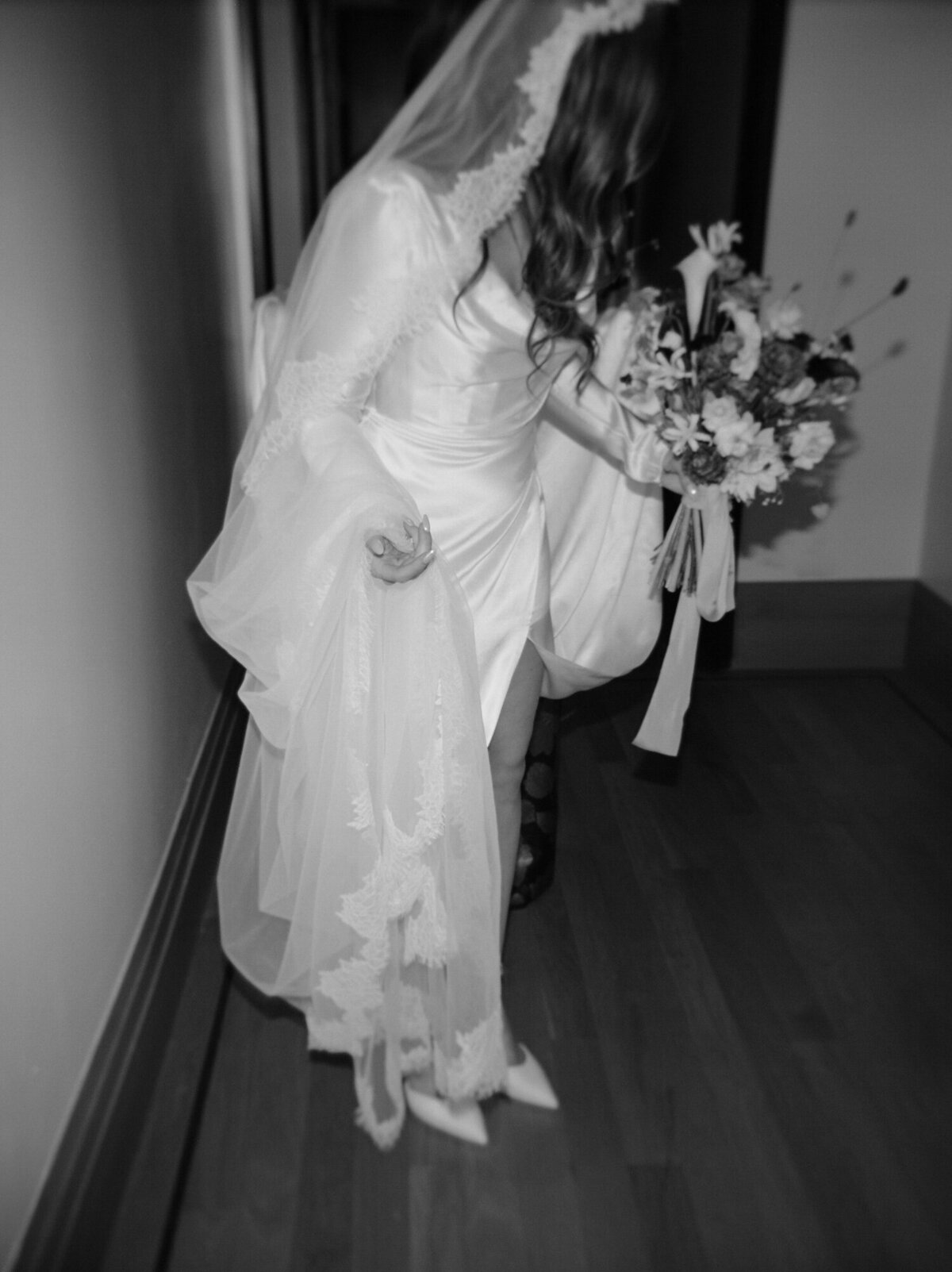 organic, candid wedding photography bride with long veil at Shinola Hotel