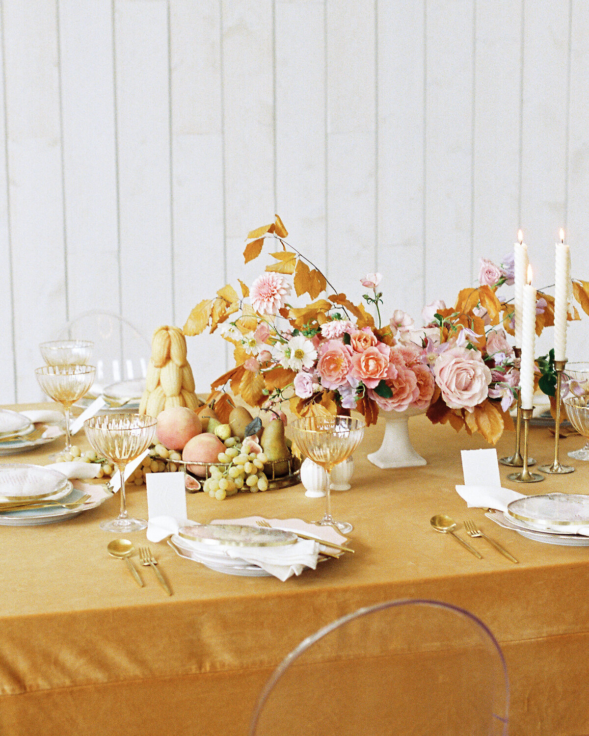 Romantic table setting  with goldenrod velvet linens