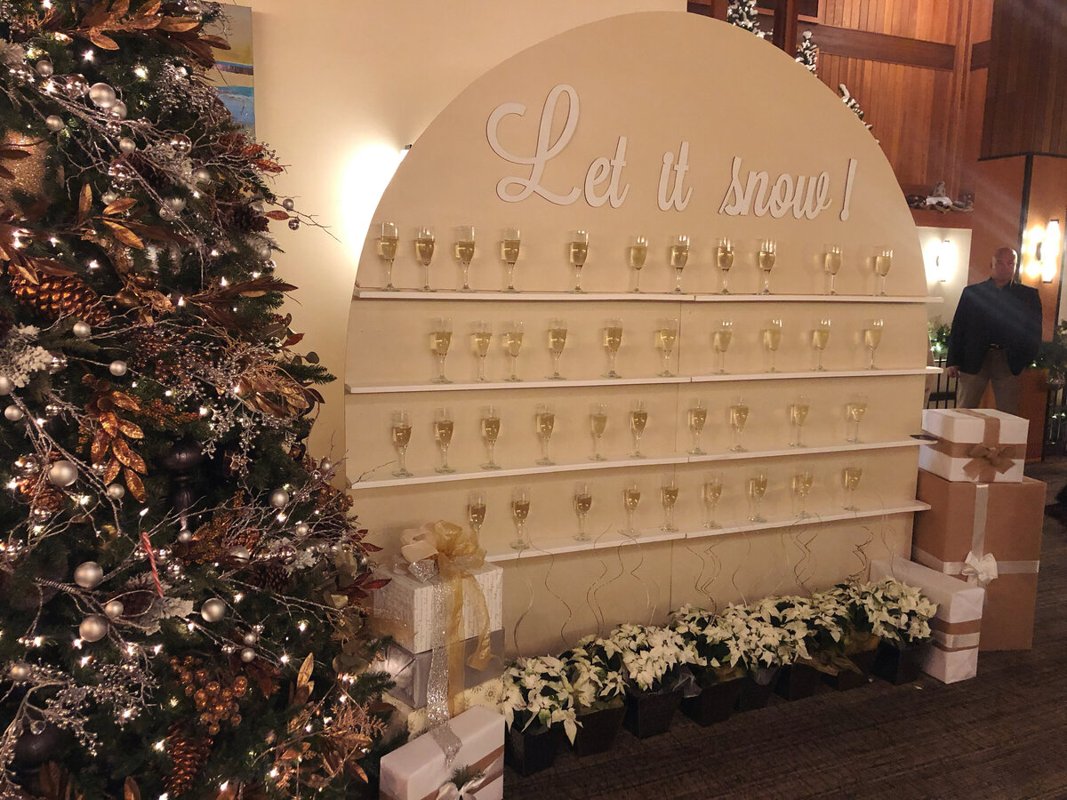 Holiday party champagne wall design