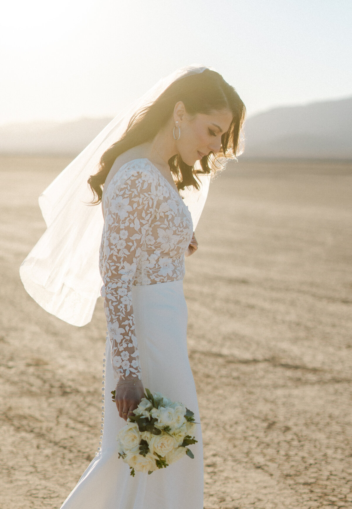 bride during golden hour at the boulder city dry lake bed just outside of las vegas, nv
