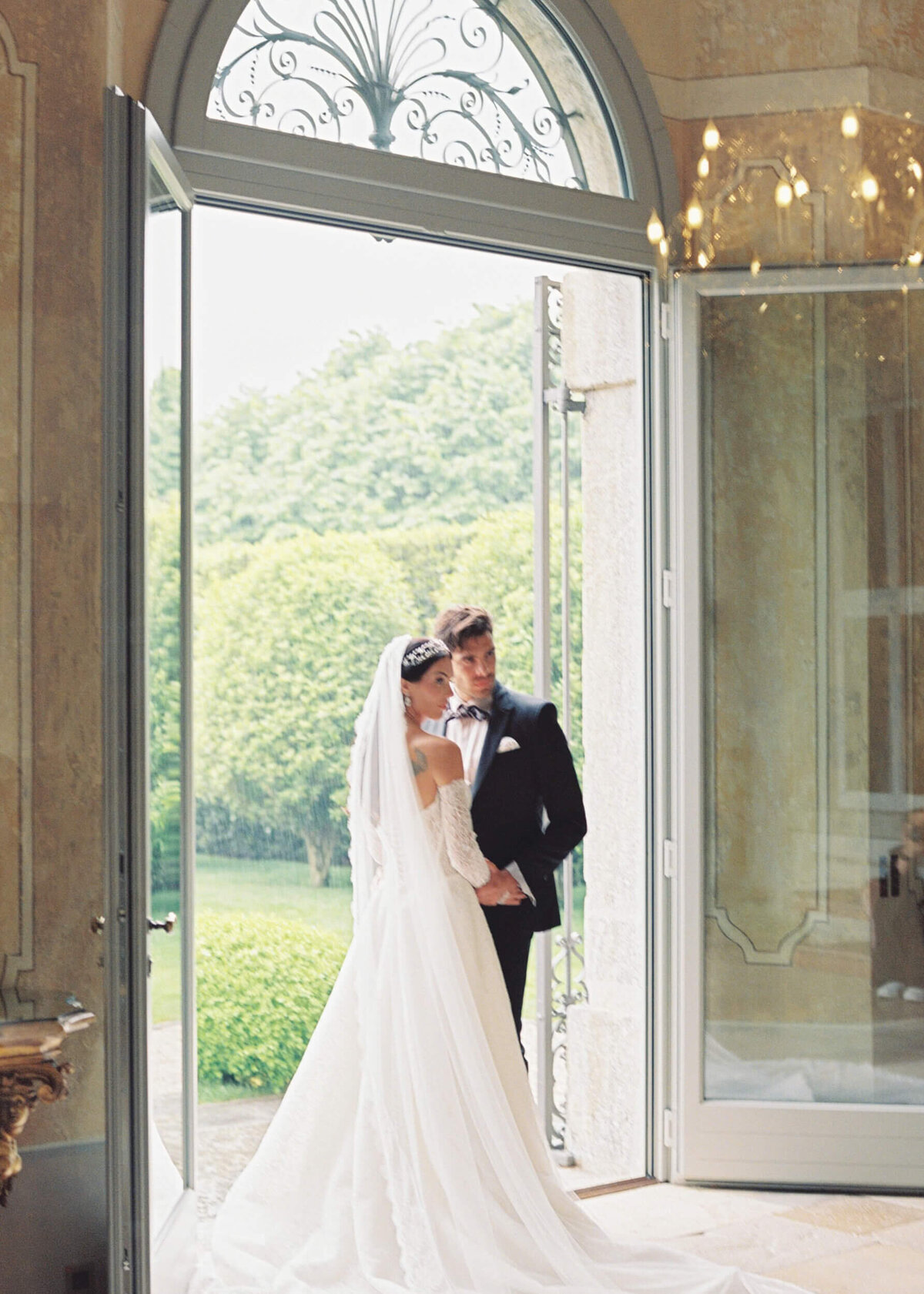 A wedding photo of the couple at Villa Balbiano on Lake Como in Italy