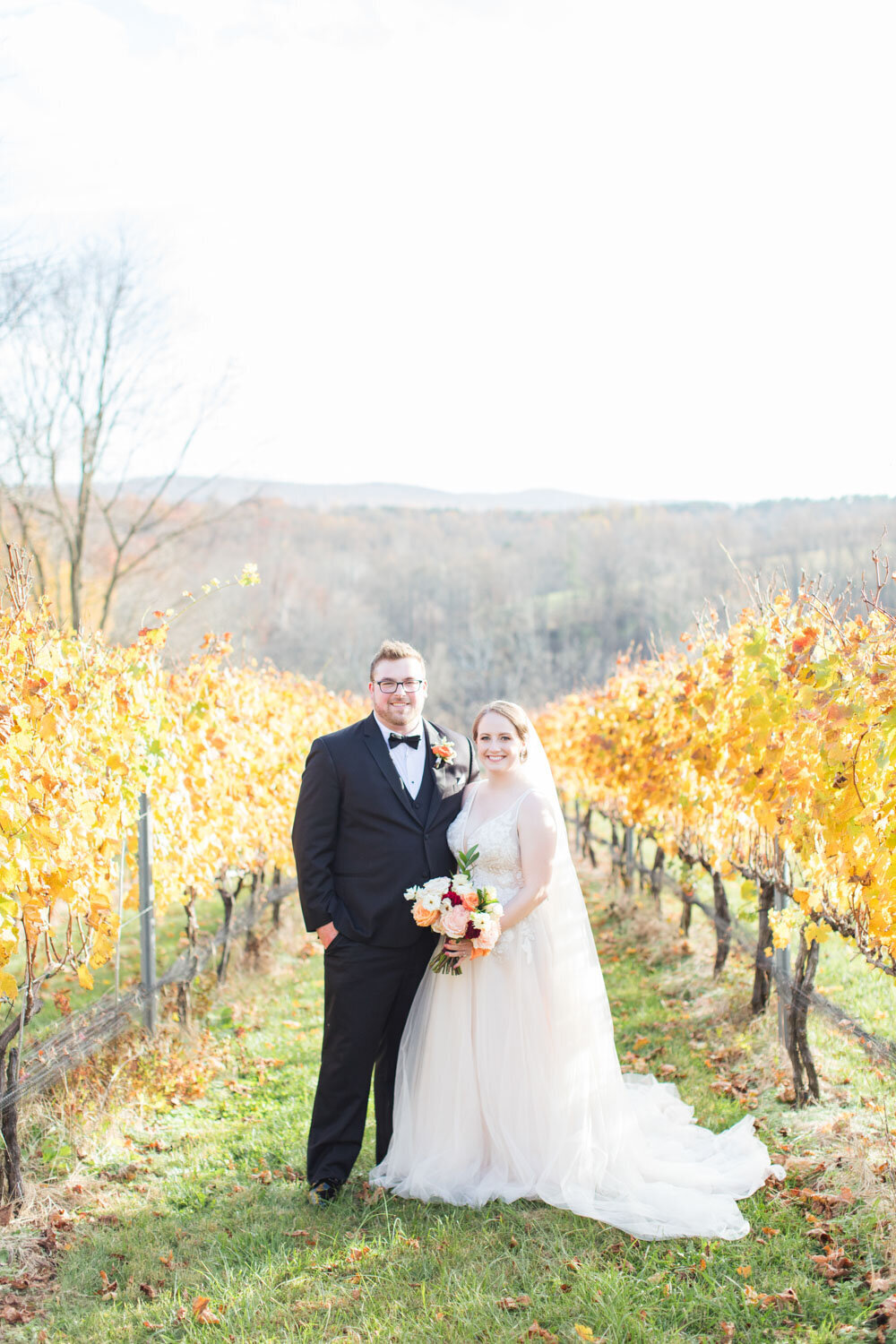Photo of bride and groom in a fall wedding season
