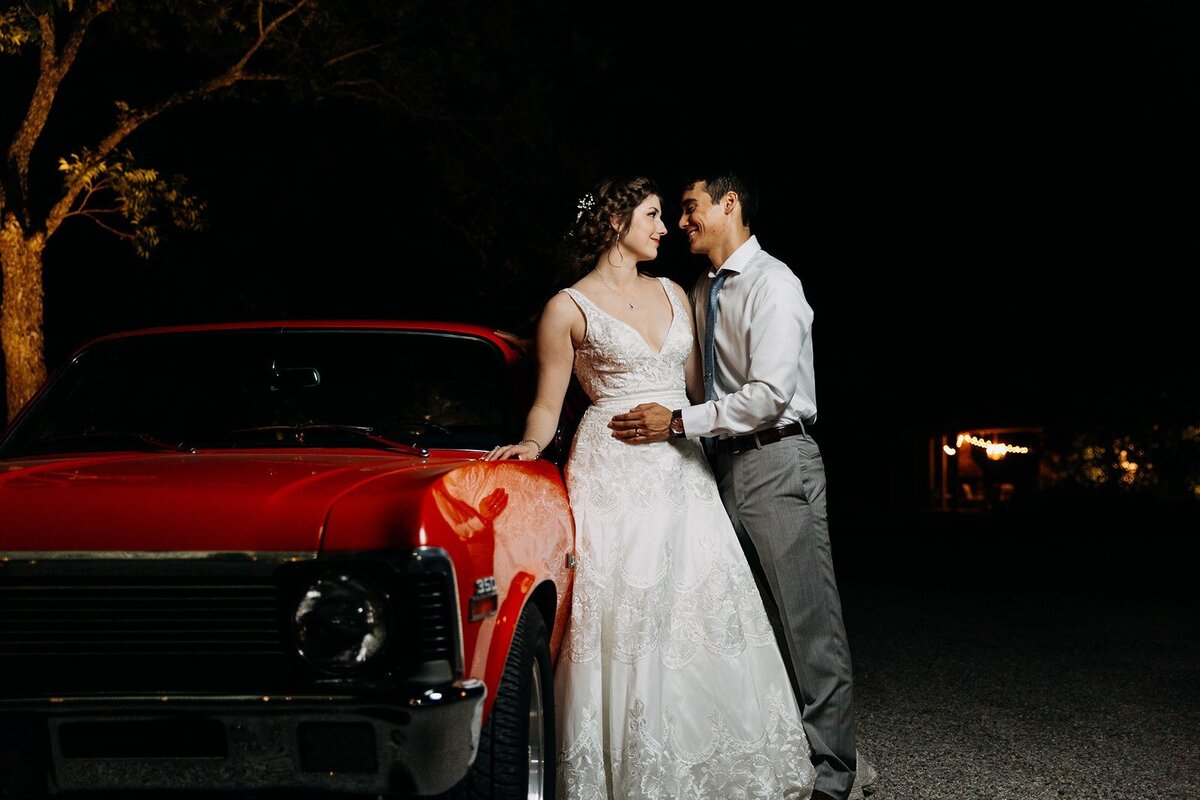 bride-groom-by-car-texas-wedding-venue