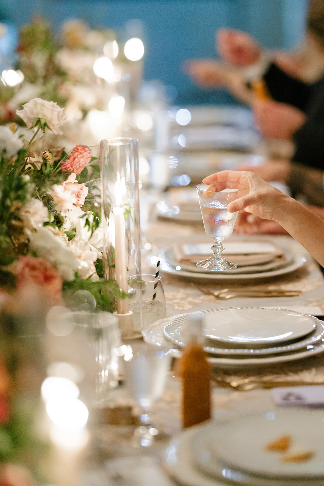 Fall wedding in Raleigh, NC highlights the beautiful autumnal setting in the Carolinas. Floral colors of copper, terra cotta, dusty pink, mauve, dusty blue, taupe, cream, and natural green. Flowers consisting of roses, dahlias, ranunculus, thistle, rain tree pods, and fall branches. Design by Rosemary and Finch Floral Design based in Nashville, TN.