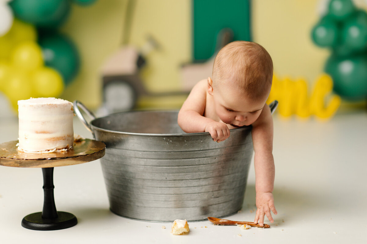 NWA cake smash photographer, milestone portrait session, baby birthday photoshoot Northwest Arkansas, best cake smash photography near me Fayetteville AR