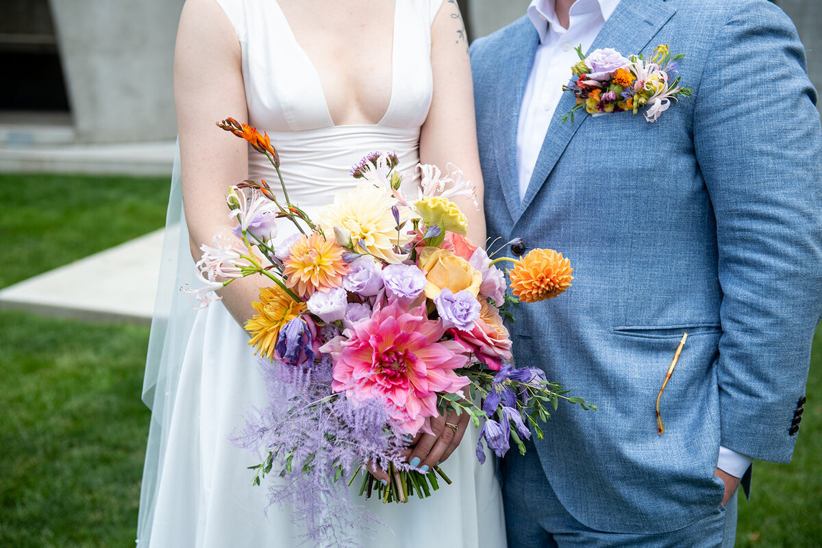Bride holds her bouquet of flowers
