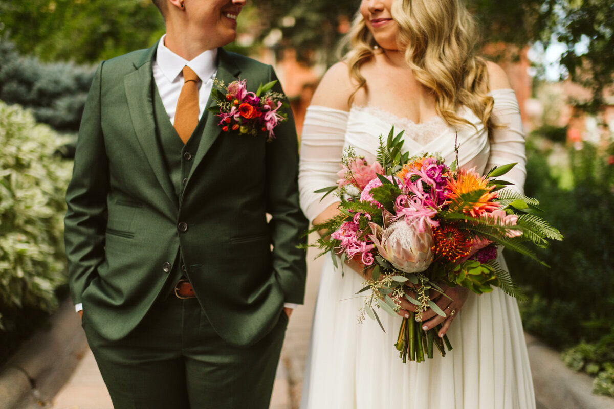 bride and groom portraits at bright and colorful wedding in Longmont, Colorado