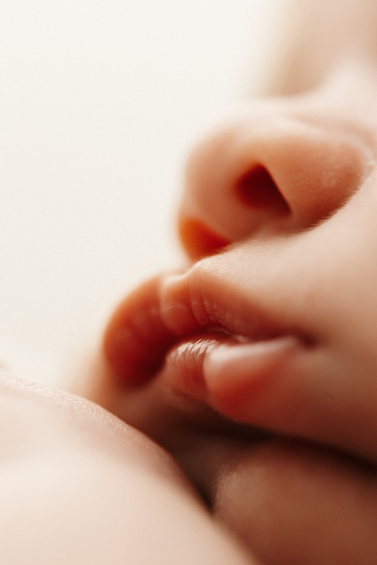 Newborn baby macro photograph of facial features photographed by christchurch newborn photographer lucy jane photography