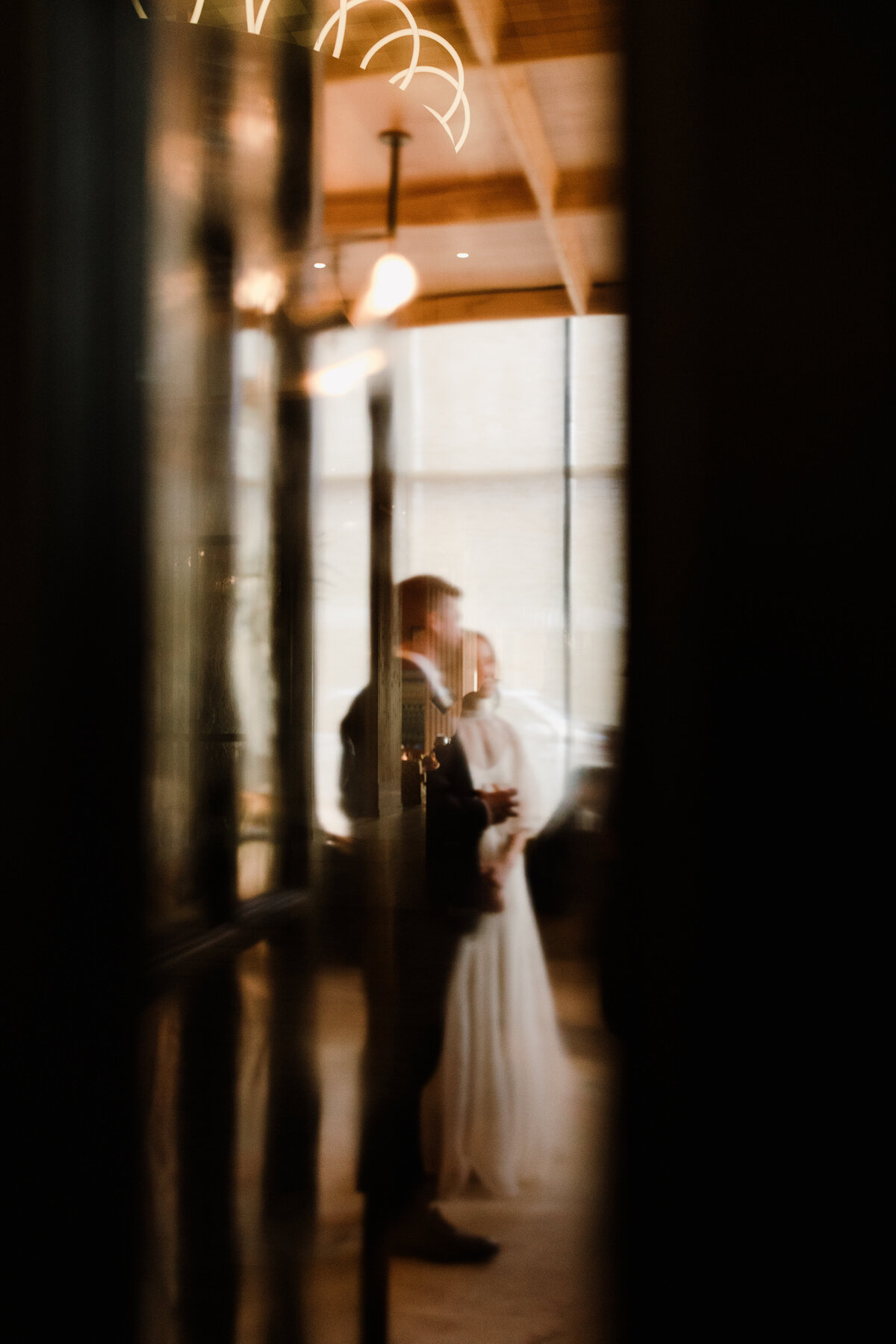A distant shot of bride and groom at Proper hotel Austin