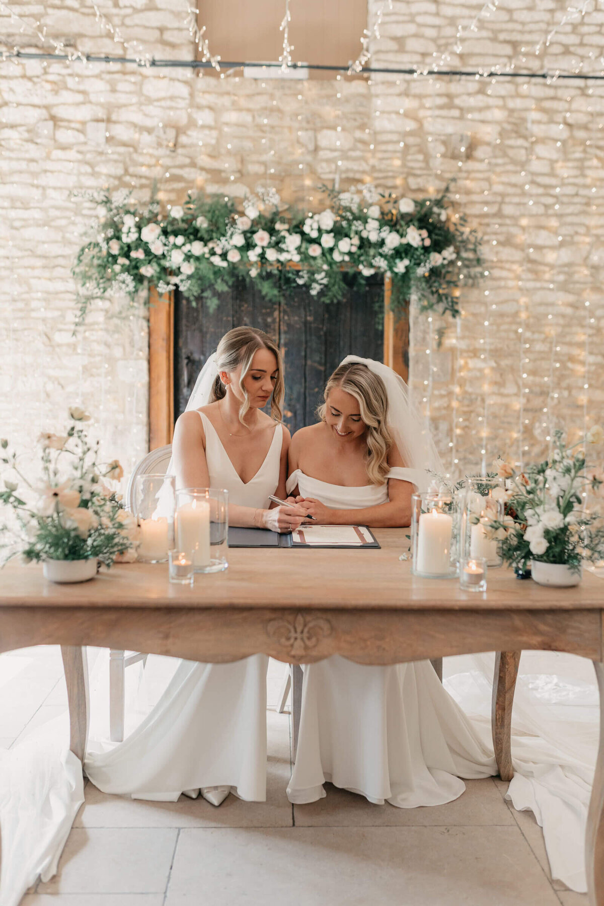 caswell-house-same-sex-wedding-signing-register-light-ceremony