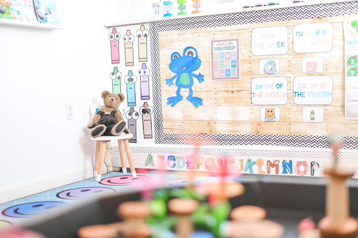 Circle time corner at House of Parker Preschool in Gorham Maine where every detail is thoughtfully designed to create a warm, welcoming space for children to explore, learn, and grow with comfort and confidence.