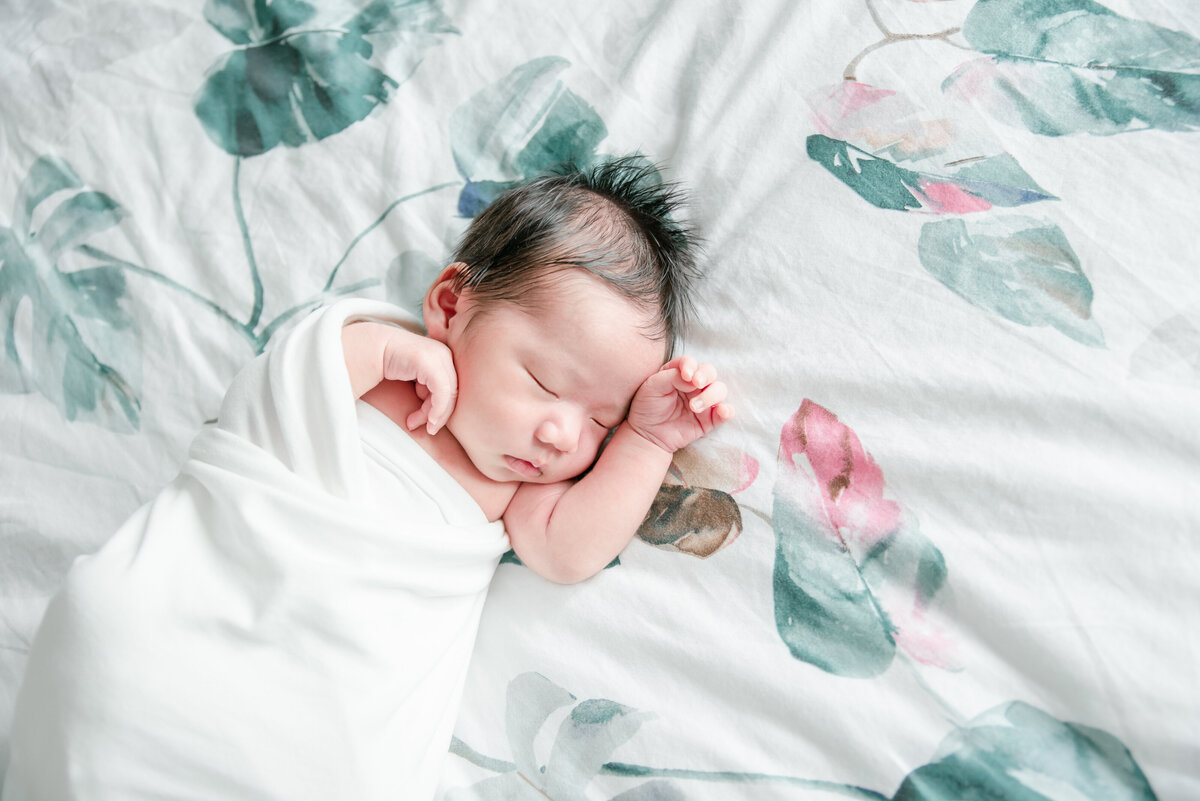 baby on bed sleeping