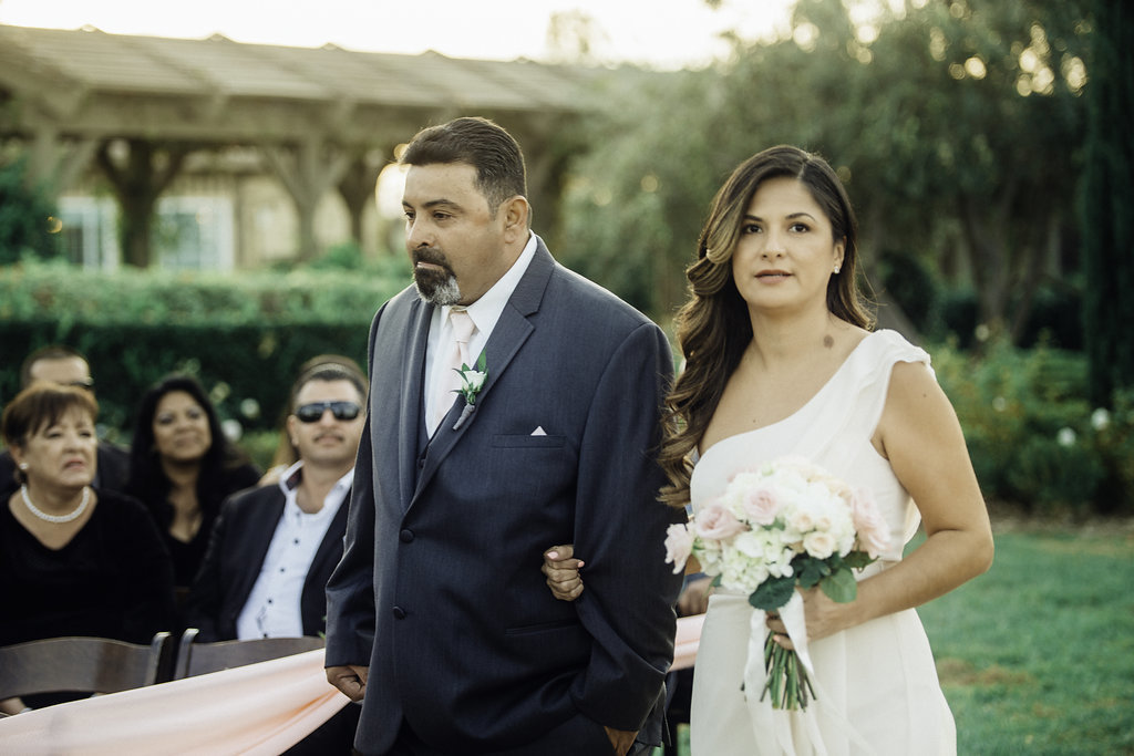 Wedding Photograph Of Groomsman And Bridesmaid Standing Los Angeles