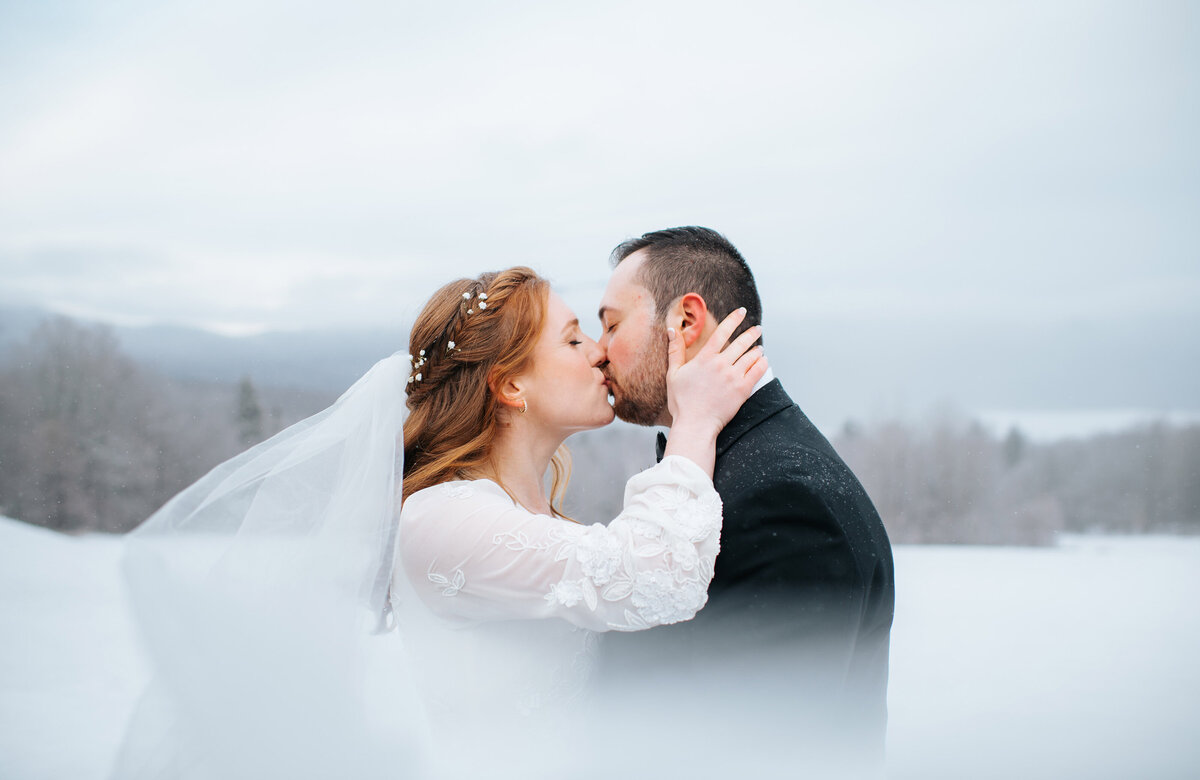 vermont winter elopement in the snow at mountain top inn