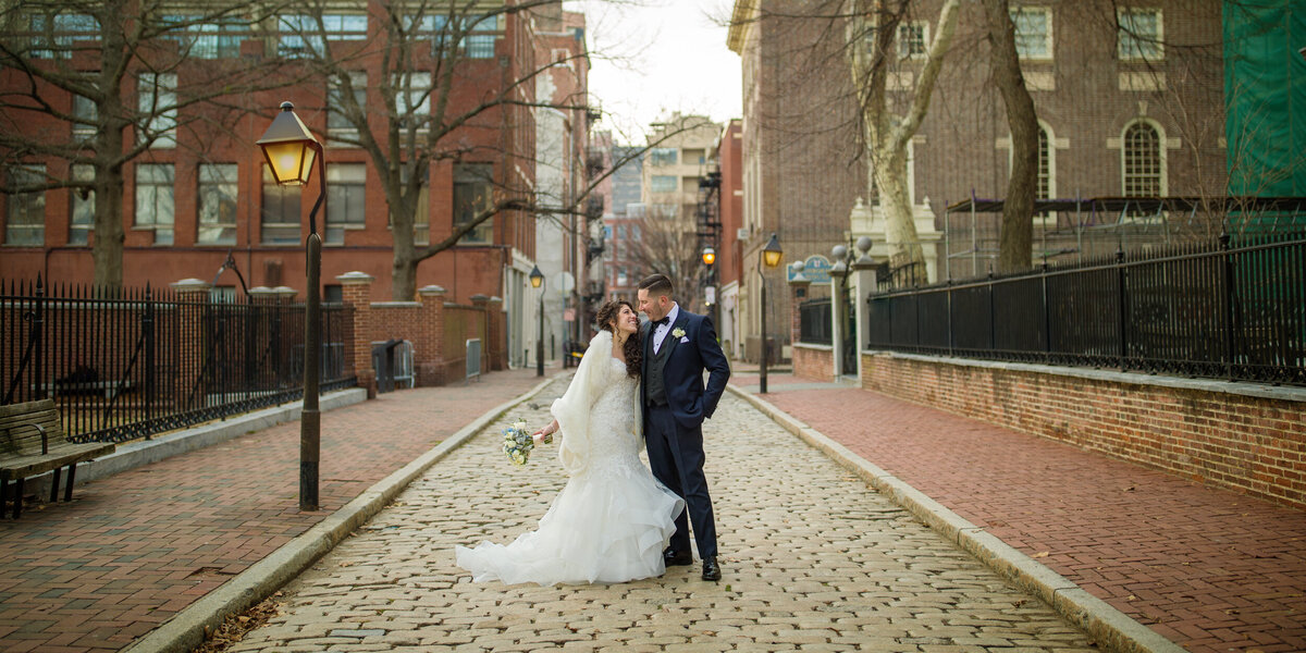 Philadelphia Wedding Couple on cobblestone
