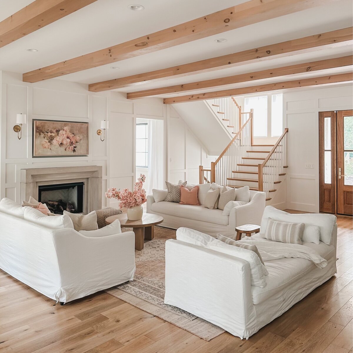 The natural wood details such as beams and millwork keeps the open, expansive first floor feeling warm and inviting