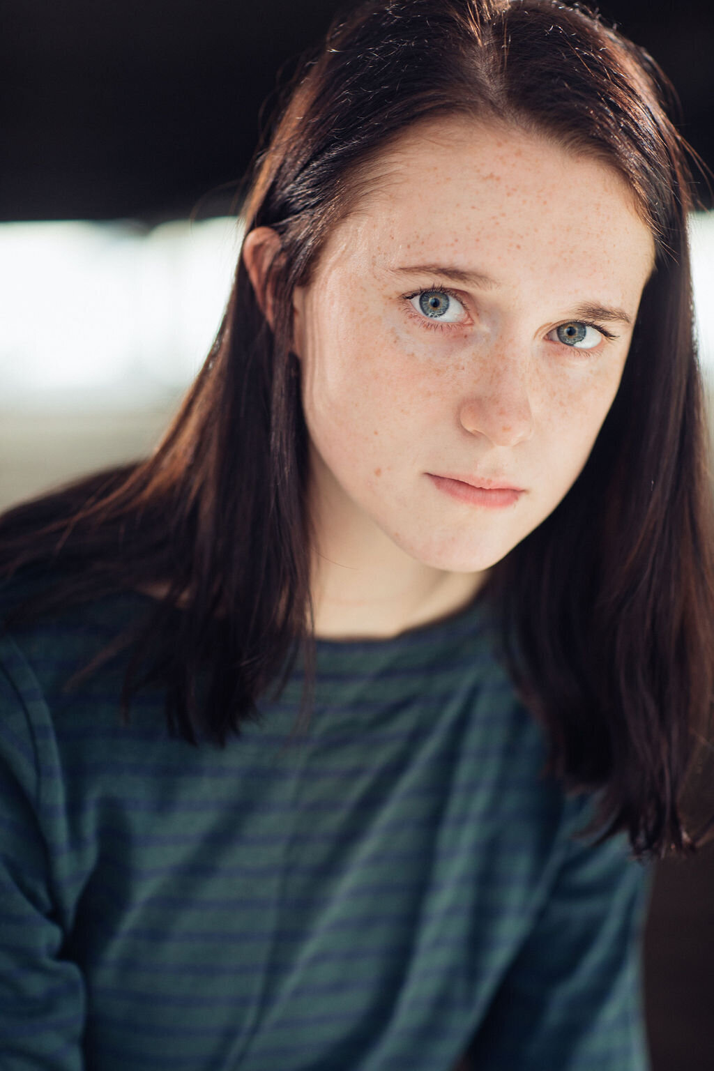 Headshot Photograph Of Young Woman In Striped Blue Long Sleeves Los Angeles