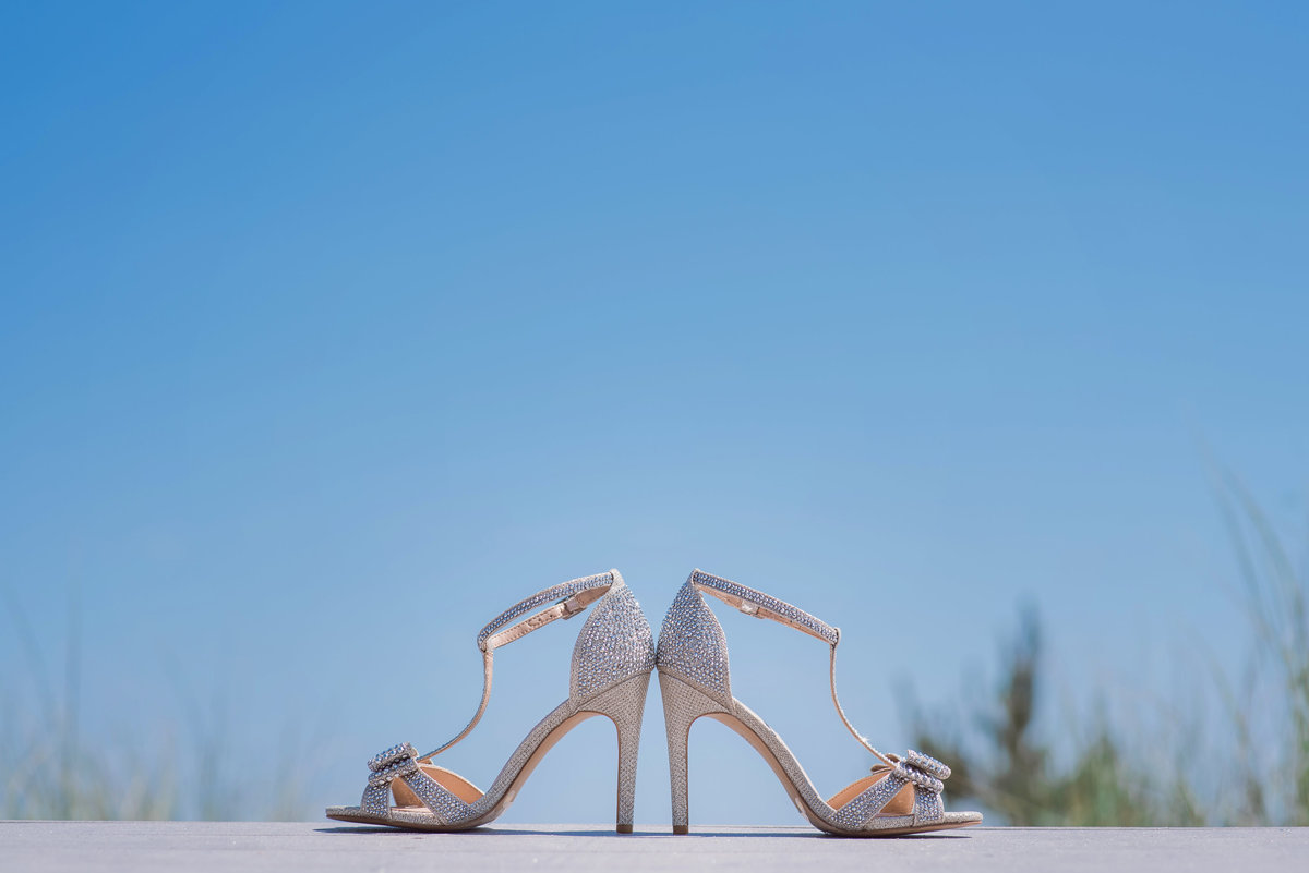 Wedding shoes on the boardwalk of Oceanbleu