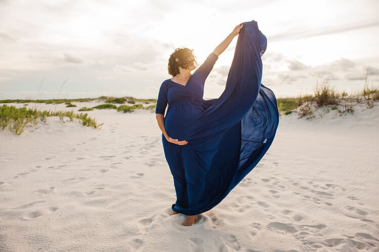 Pensacola Beach maternity  session in  National Seashore  with dunes in background