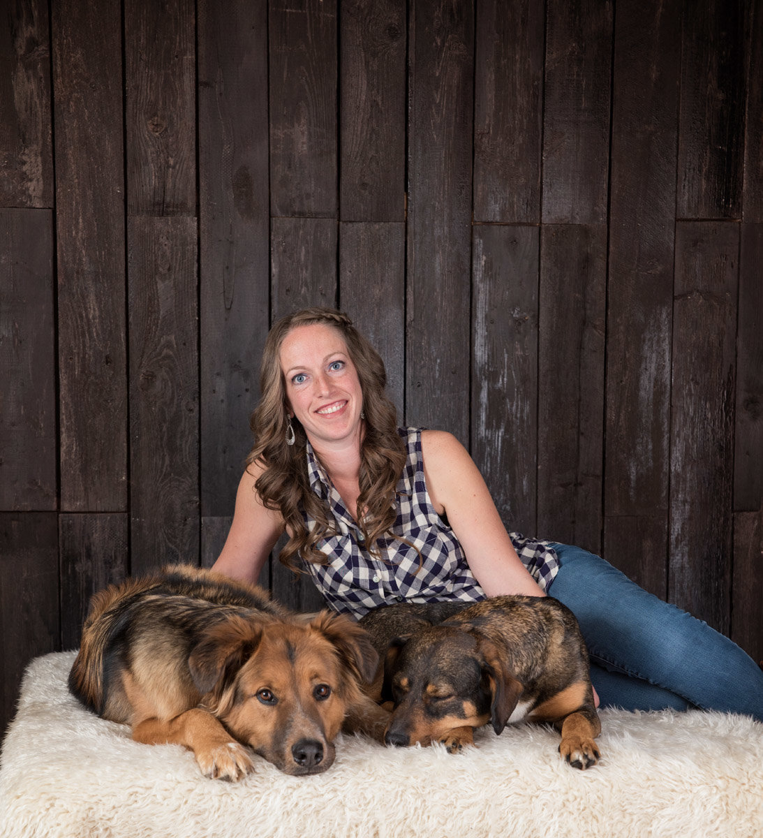 photo of woman with her two dogs in studio