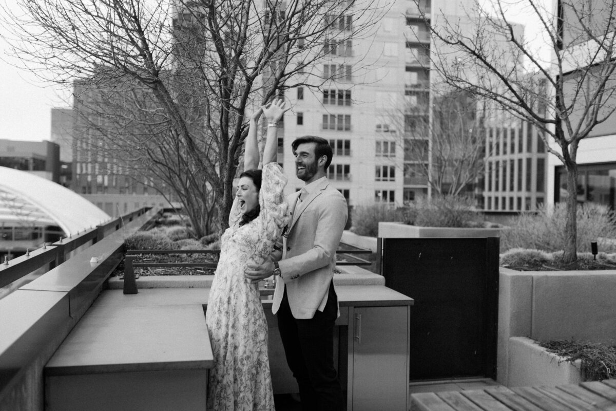 Rooftop proposal in downtown Minneapolis photographed by Emmie Verdell Photo.