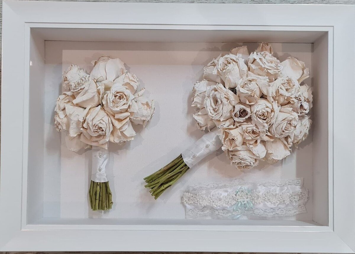 Wedding bouquet preserved in 3D frame.