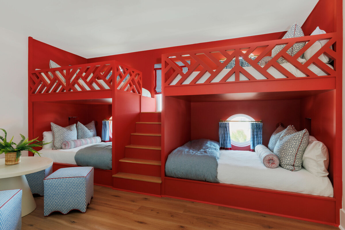 oyster creek studios lighthouse on the lake red bunk beds with port windows and curtains in bedroom