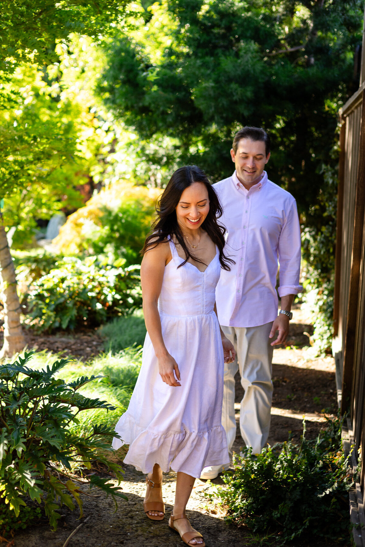 Couple walking together along shaded garden path, Bay Area Family Portfolio – Ellobelle Photography