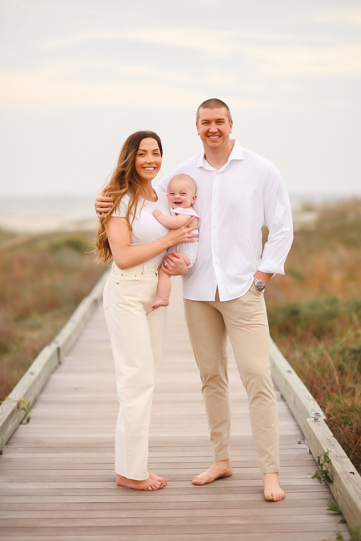 Family poses for Pictures during Family Photos on Isle of Palms. 
