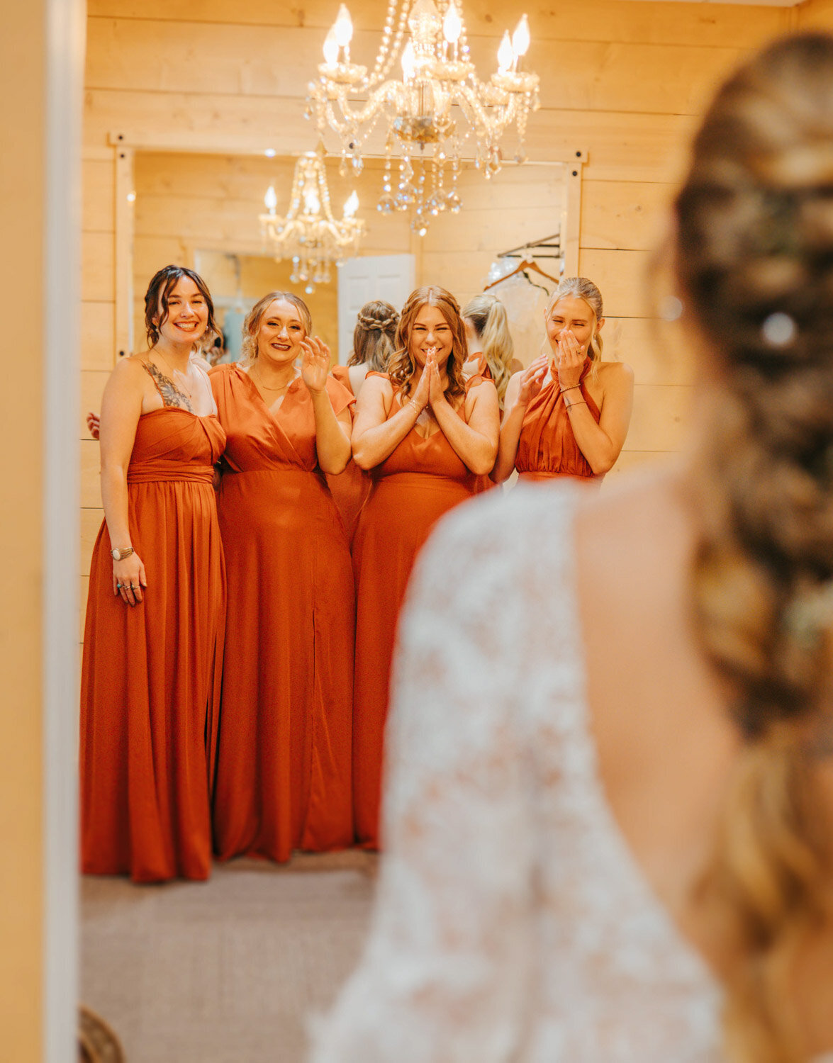 Bridesmaids lovely first look of the bride