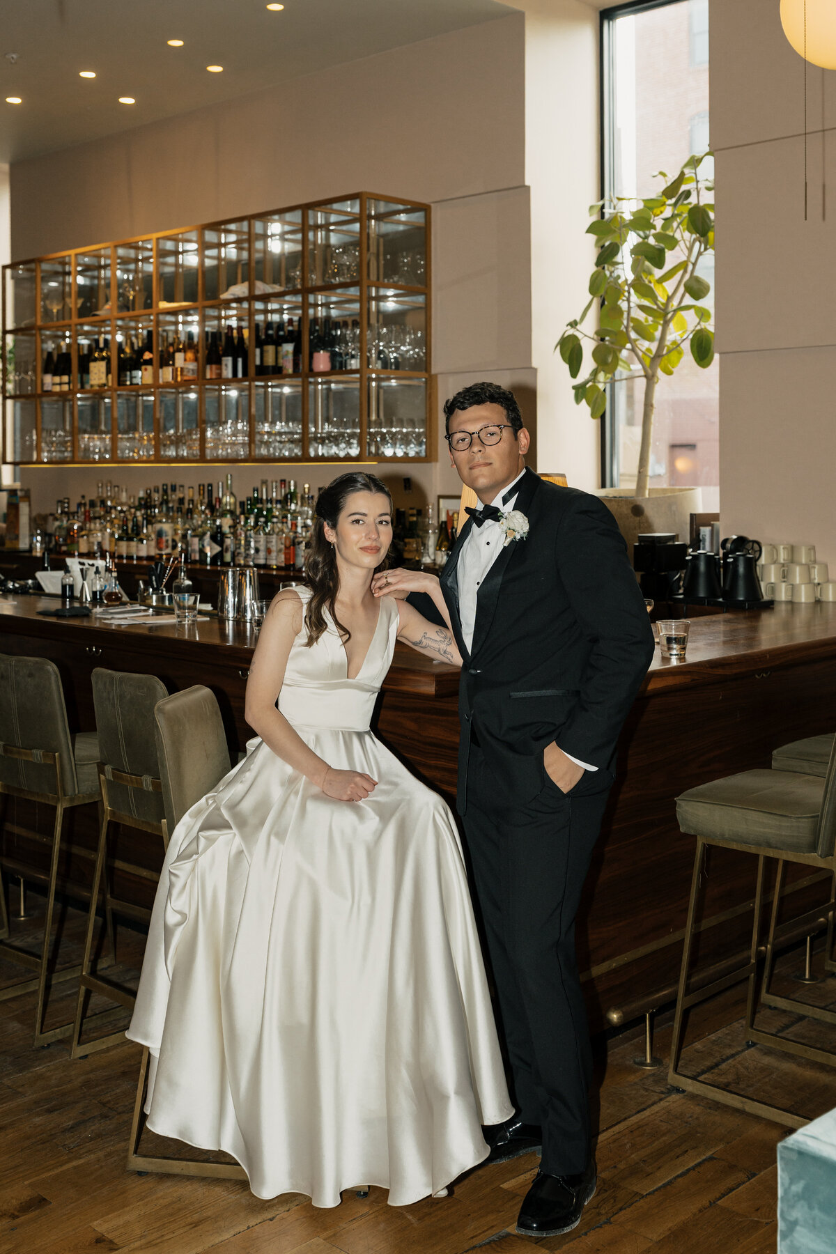 Editorial wedding photos inside a moody vintage wine bar – perfect for Tulsa engagement or elopement sessions