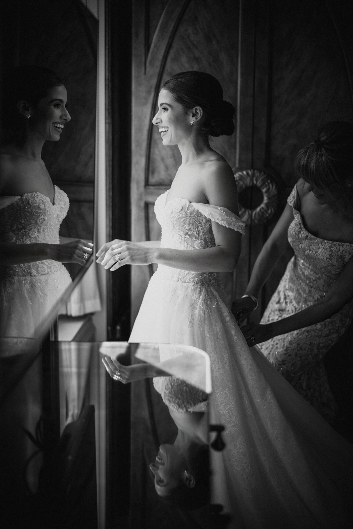 A bride gets dressed  at a Beekman Hotel wedding