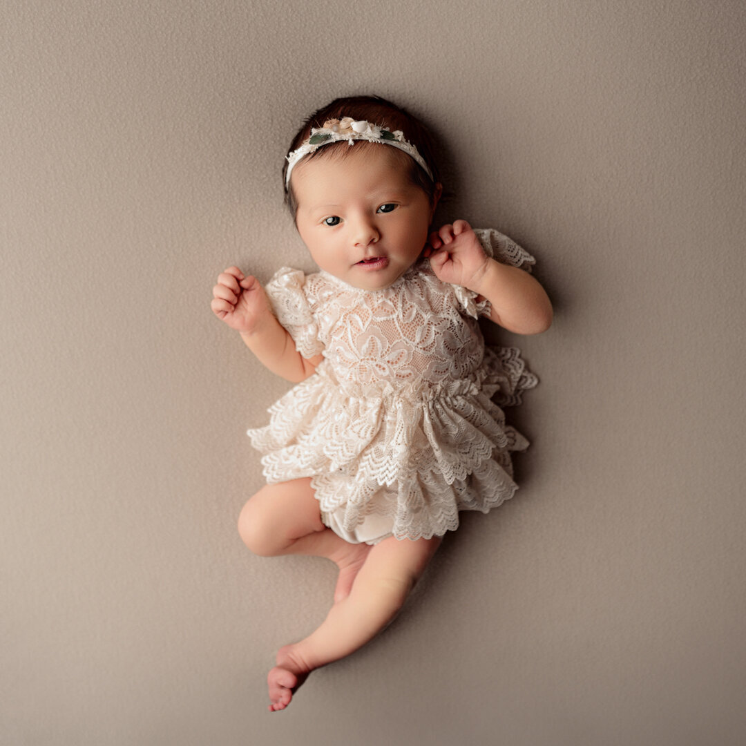 Grand Rapids Newborn Photography Baby Kicking by For the Love of Photography