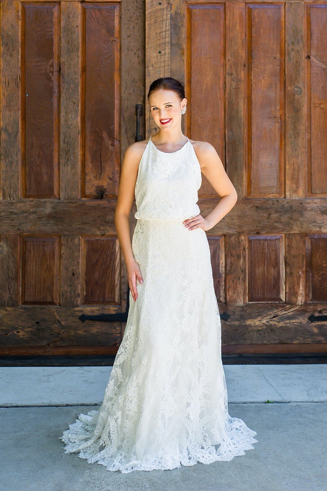 Sabine is an all-lace wedding dress with a bloused, high-neck bodice by bridal designer Edith Elan of Charleston, SC.