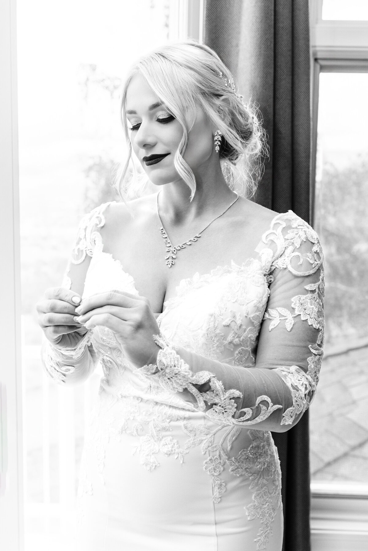 Black and white portrait of bride getting ready at private home in Missoula, MT