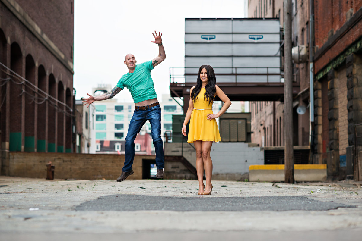 A sexy couple having fun in their engagement session.