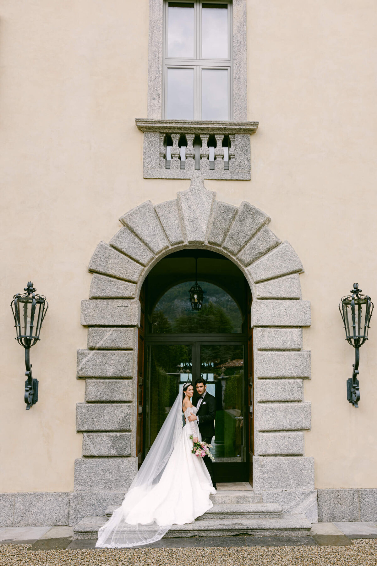 A wedding photo of the couple at Villa Balbiano on Lake Como in Italy