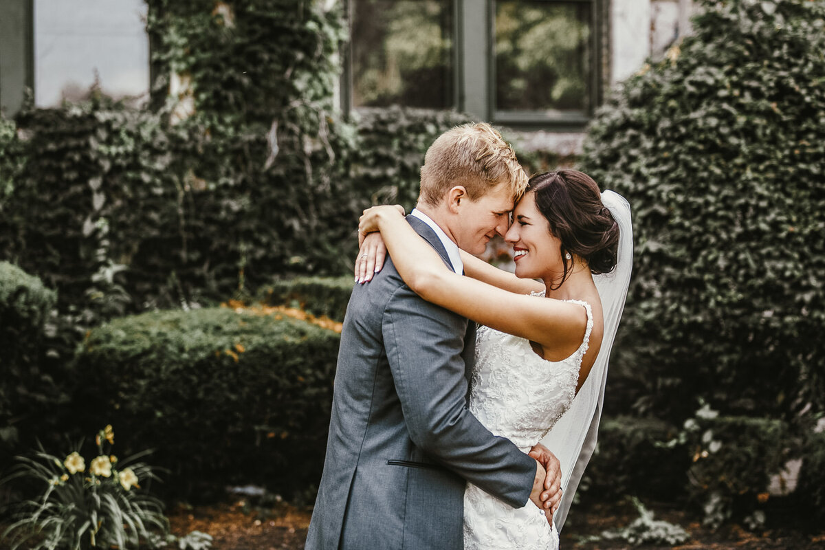 Bride and Groom embracing outside in Buffalo, New York