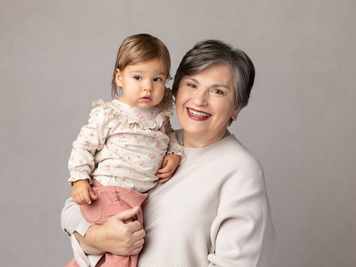 portrait of a grandma and her granddaughter