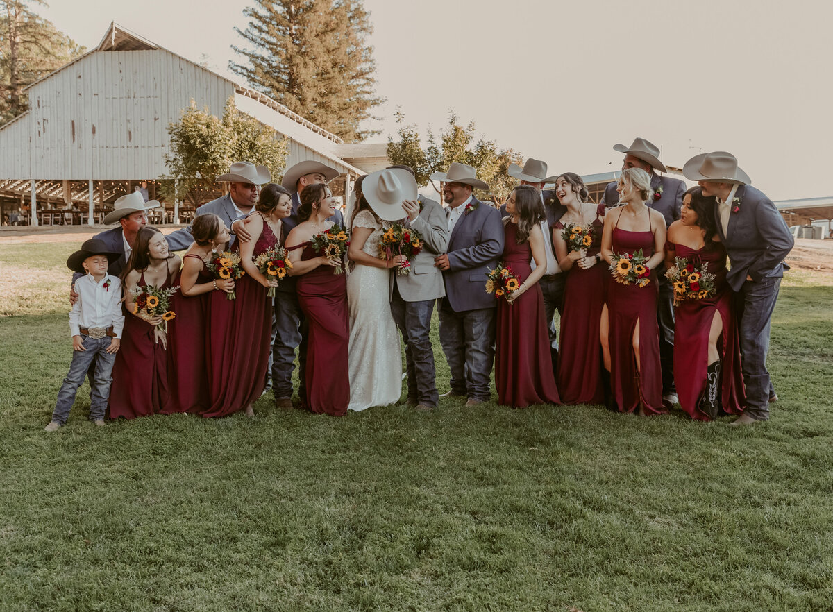 Bridal party under cowboy hats