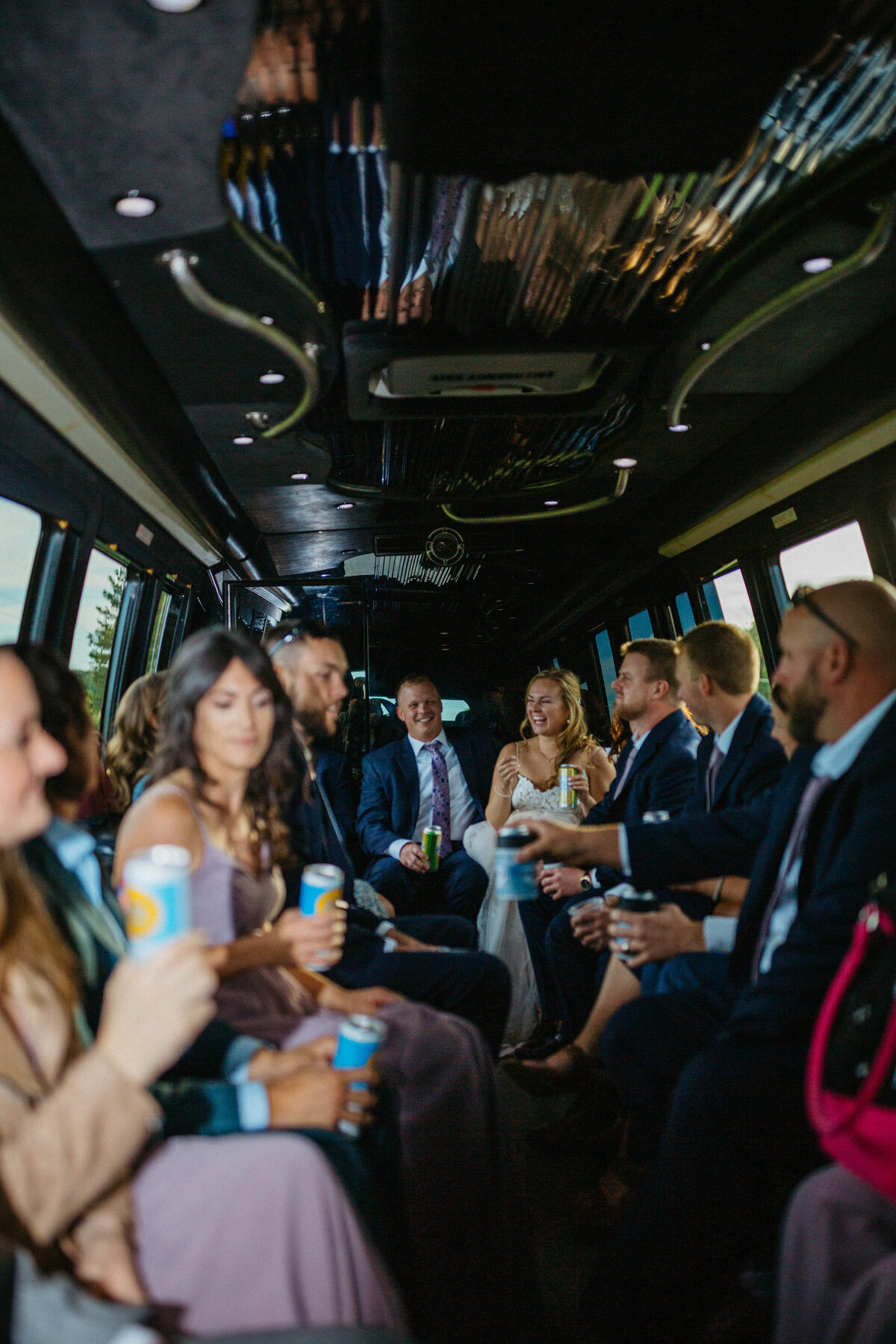 bride-and-groom-and-bridal-party-on-partybus